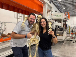 Marketing team with decorative skeleton in affordable aluminum factory