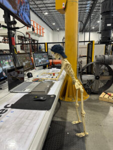 skeleton working on affordable aluminum production line